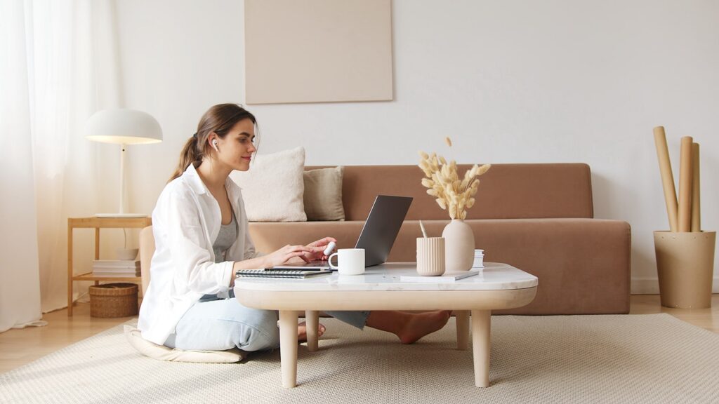 Woman on laptop in calm setting