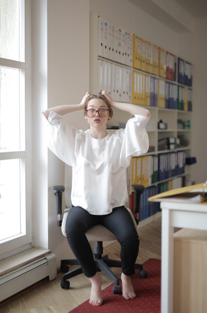 confused lady at work desk